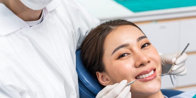 Caucasian,Dentist,Examine,Tooth,For,Young,Girl,At,Dental,Health Dentist Near Me San Francisco