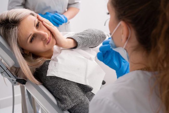 Beautiful,Caucasian,Girl,With,Toothache,Sits,In,A,Dental,Chair. Emergency Dentist San Francisco