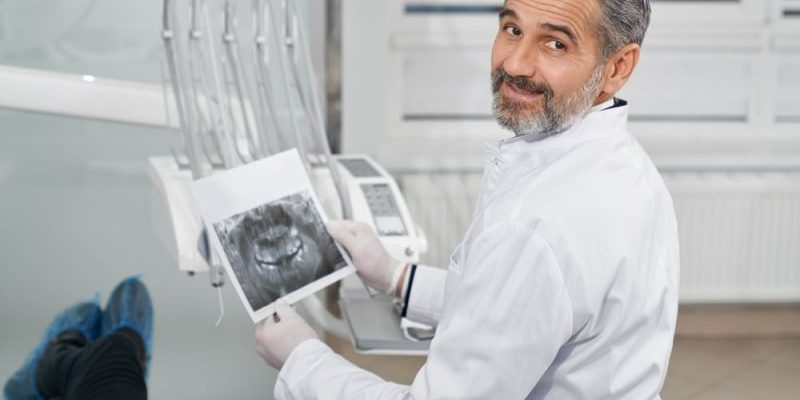 Professional,,Cheerful,Doctor,Of,Dentistry,Clinic,Sitting,In,Chair.,Bearded, Dentist Near Me San Francisco